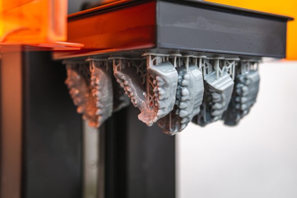Jaw,Models,Being,Printed,In,Resin,On,A,3d,Printer